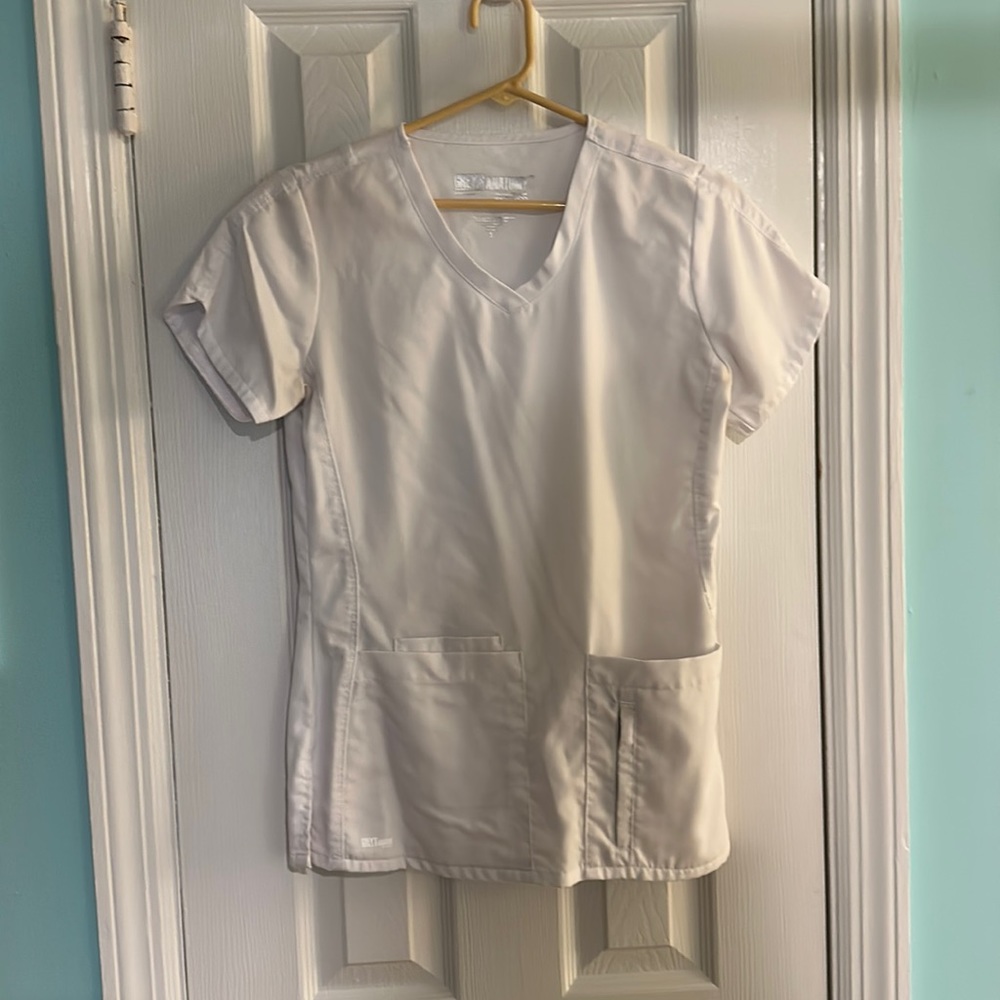 Greys anatomy white scrub top.